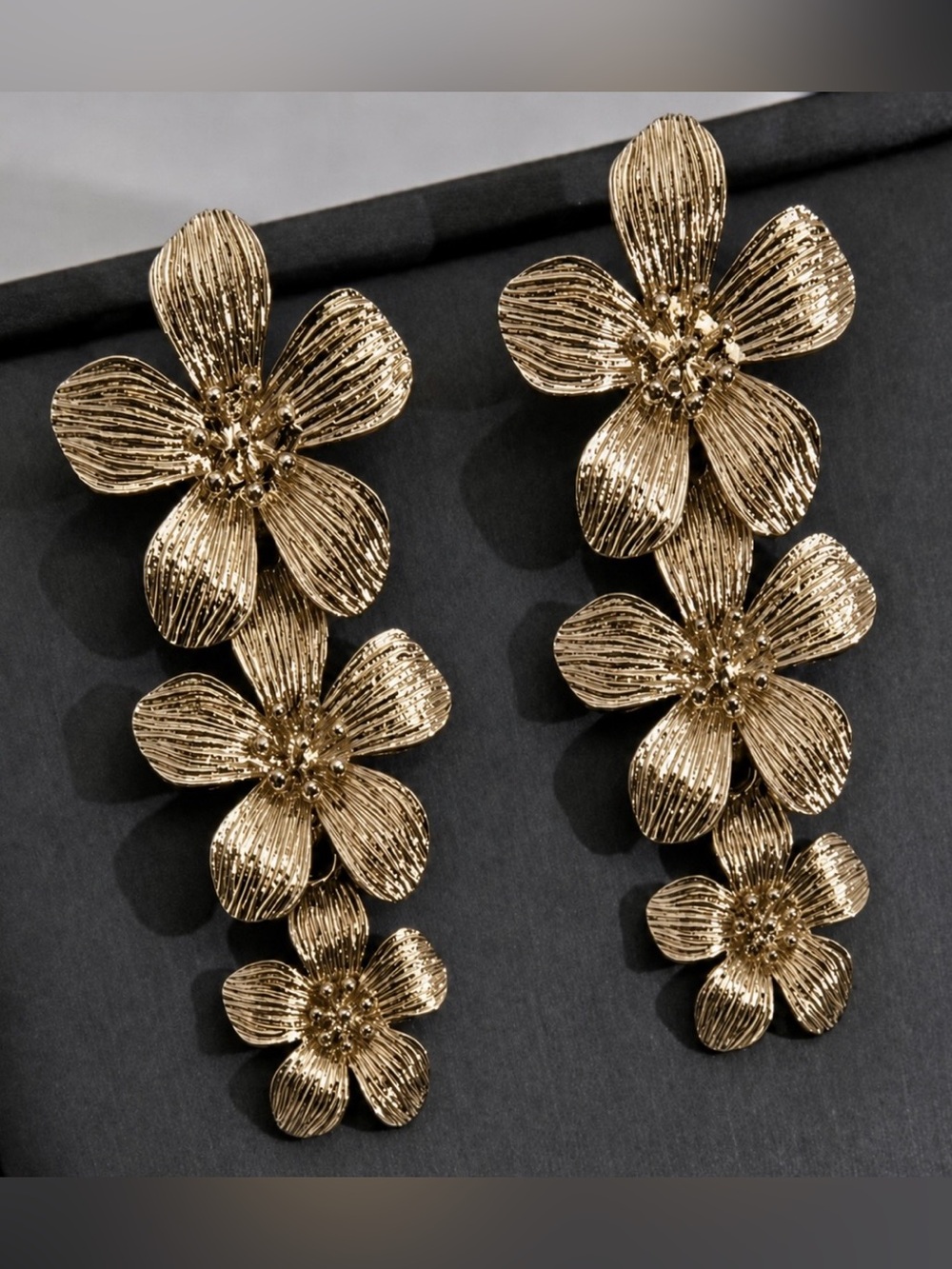 Brand new Matte Gold Triple Flower Earrings cascading